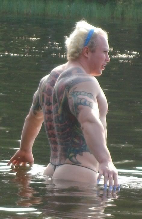 strange bodybuilder was spotted on the lake shore 6