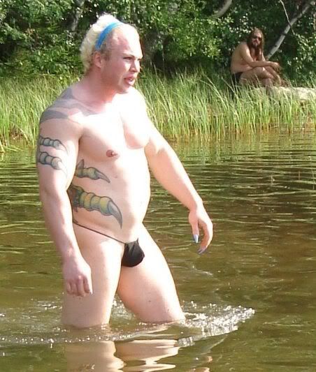strange bodybuilder was spotted on the lake shore 7