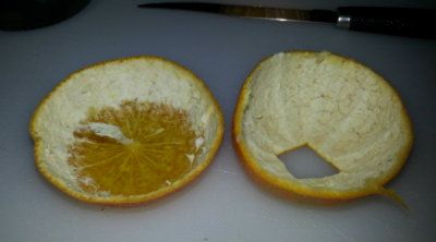 Olive Oil in the bottom of the clementine