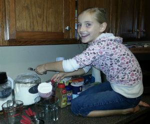 Baking Assistant Preparing Dry Ingredients for Peanut Butter Blossoms