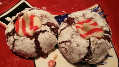 Chocolate Crinkles with Candy Cane Hershey Kisses ontop