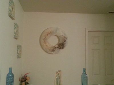 White Coffee Filter Wreath hanging in Bathroom